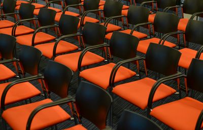 Rows of chairs at a security conference.